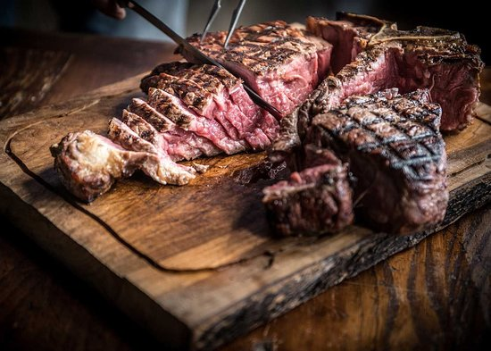 A steak that is being cut