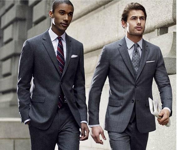 A couple of men in suits

Description automatically generated with low confidence