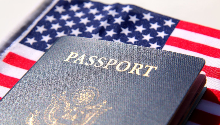 a passport on an USA flag
