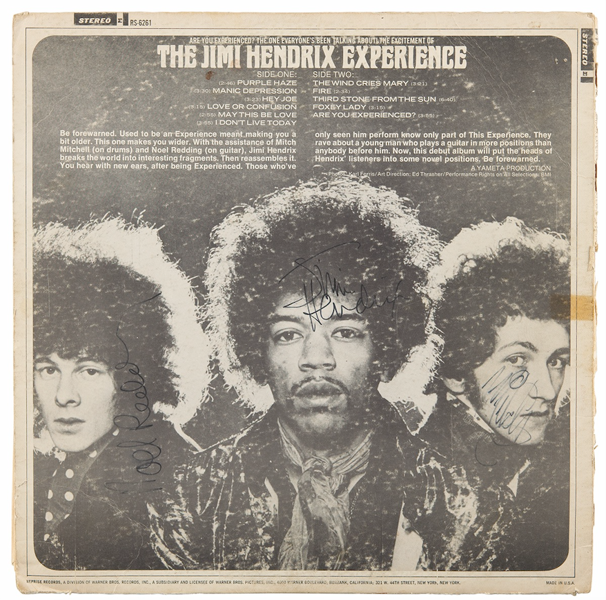 Original U.S. stereo issue of Are You Experienced by The Jimi Hendrix Experience. Each band member signs over their likenesses on the album’s back cover. Photograph by RR Auction.