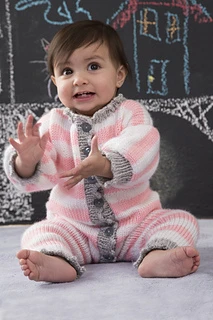 baby sitting up wearing pink, white and gray one piece
