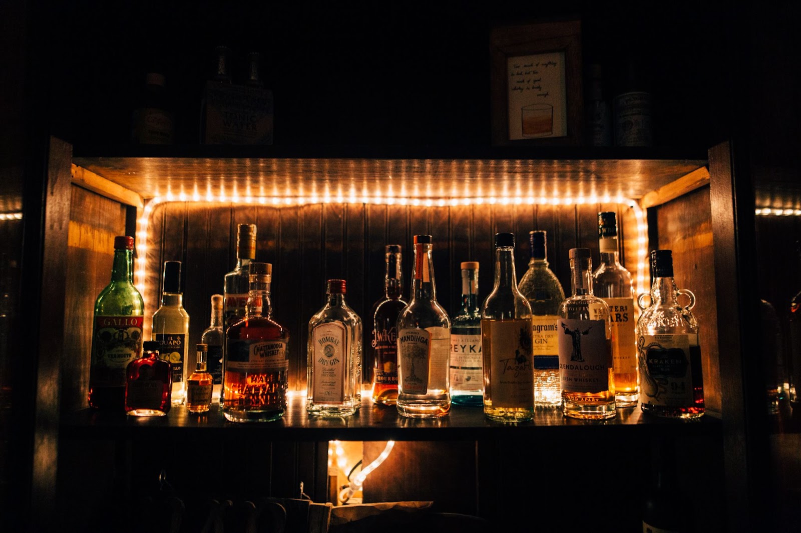 Drinks cabinet with strip lighting