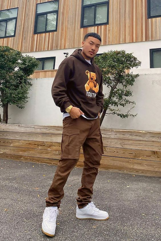 man wearing brown cargo pants with matching teddy hoodie