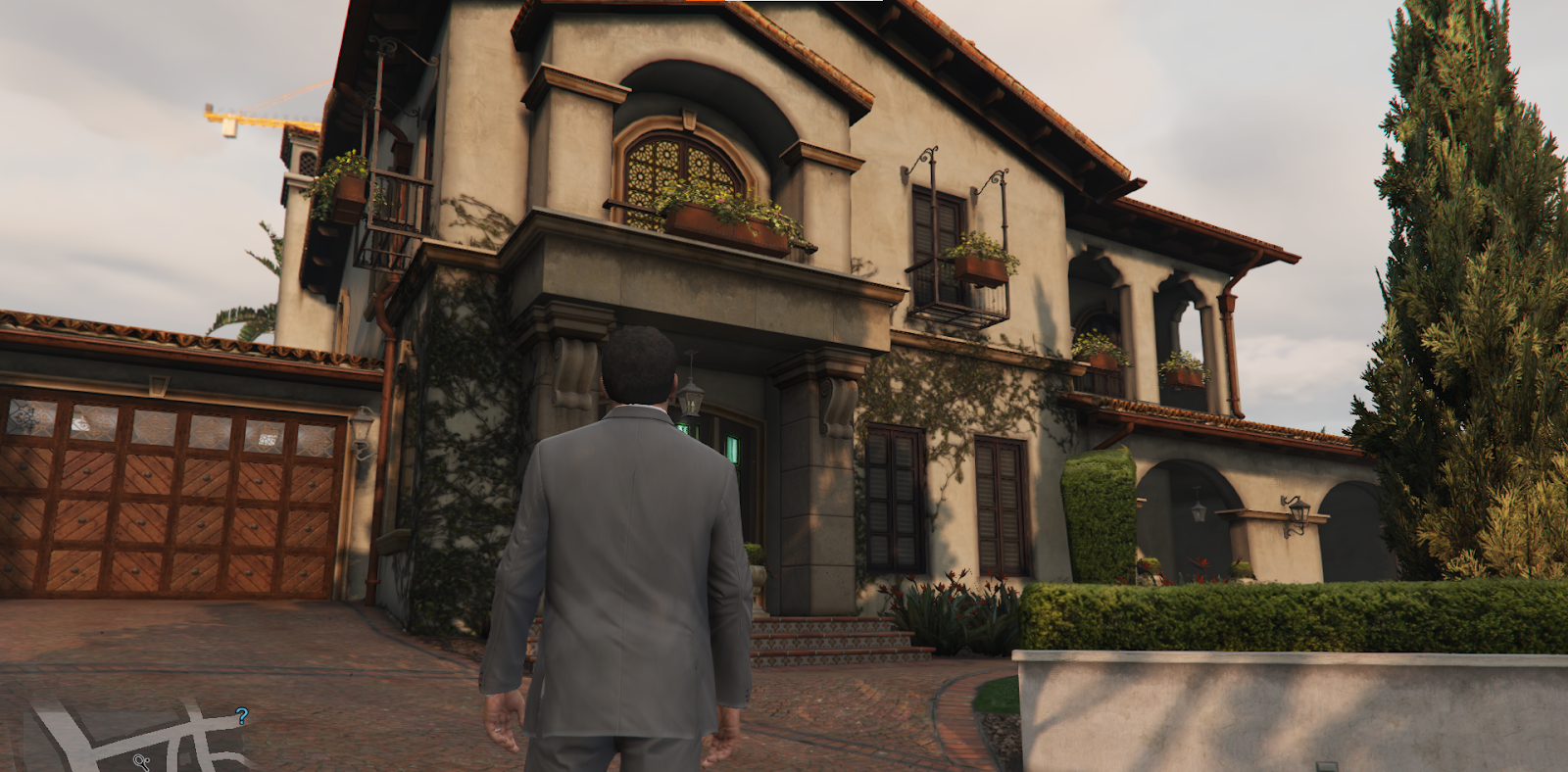 Go back to Michael's house to get a Smart Outfit in GTA V.