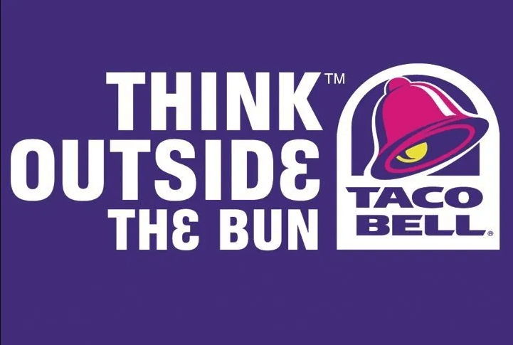 A Taco Bell ad displaying their revamped cliche tagline, 'Think Outside the Bun'.