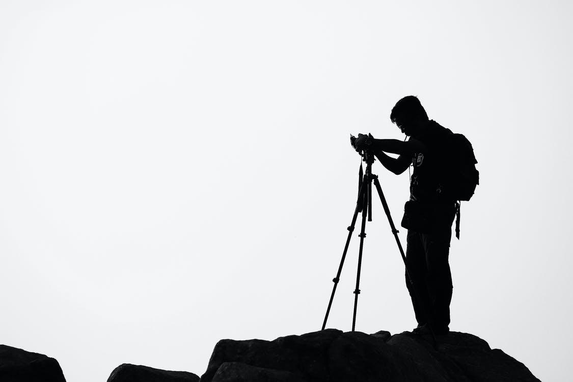 Free Silhouette of Man Holding Camera Stock Photo