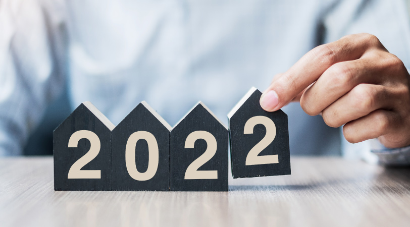 House shaped wooden blocks showing “2022”