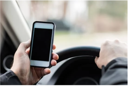 Cell phone use while driving is illegal in Florida