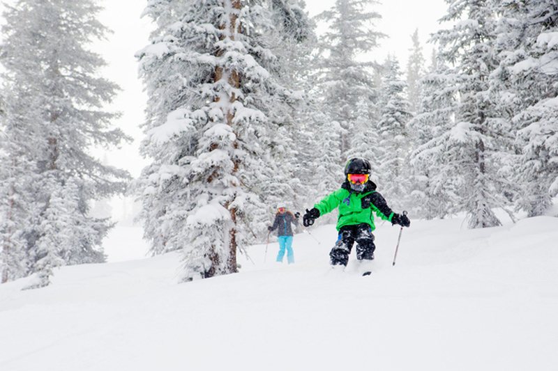 kids skiing down the mountain