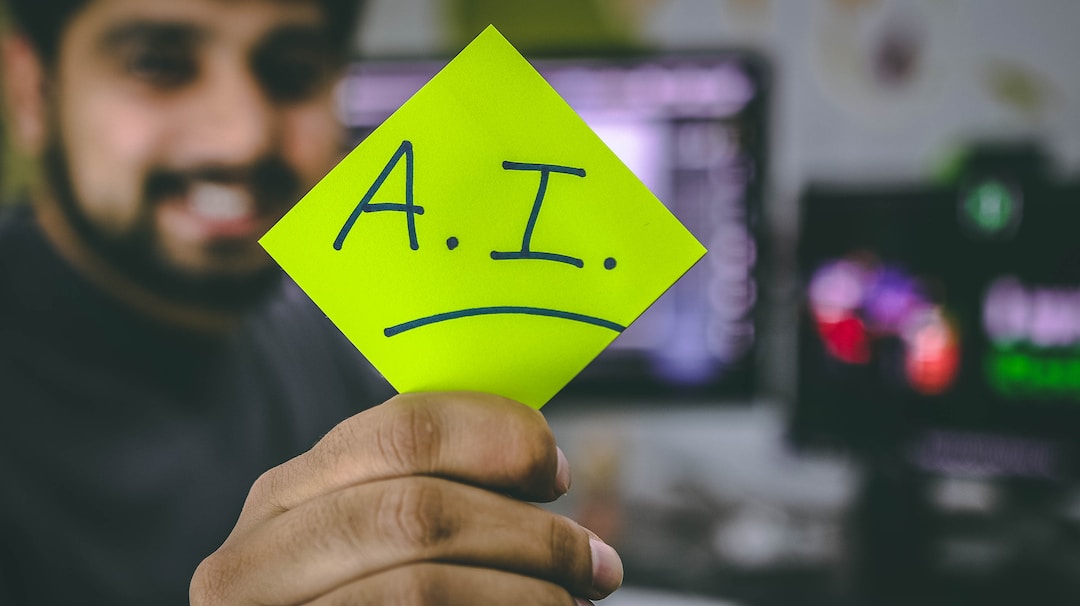 Person holding Post-It note with "A.I." written on it to represent how artificial intelligence can be used for resource forecasting technology