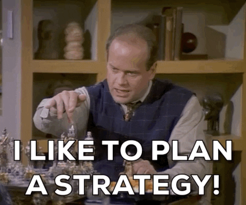 In this gif Fraiser from the TV series of the same name is playing chess whilst saying the phrase "I like to plan a strategy!"

Underneath him there is white text white says the same phrase. 