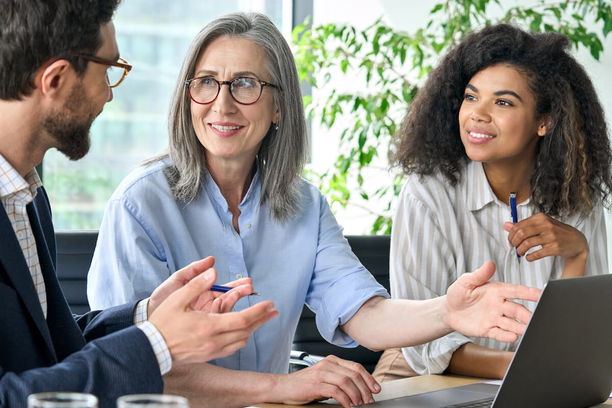 Employees discussing at an office