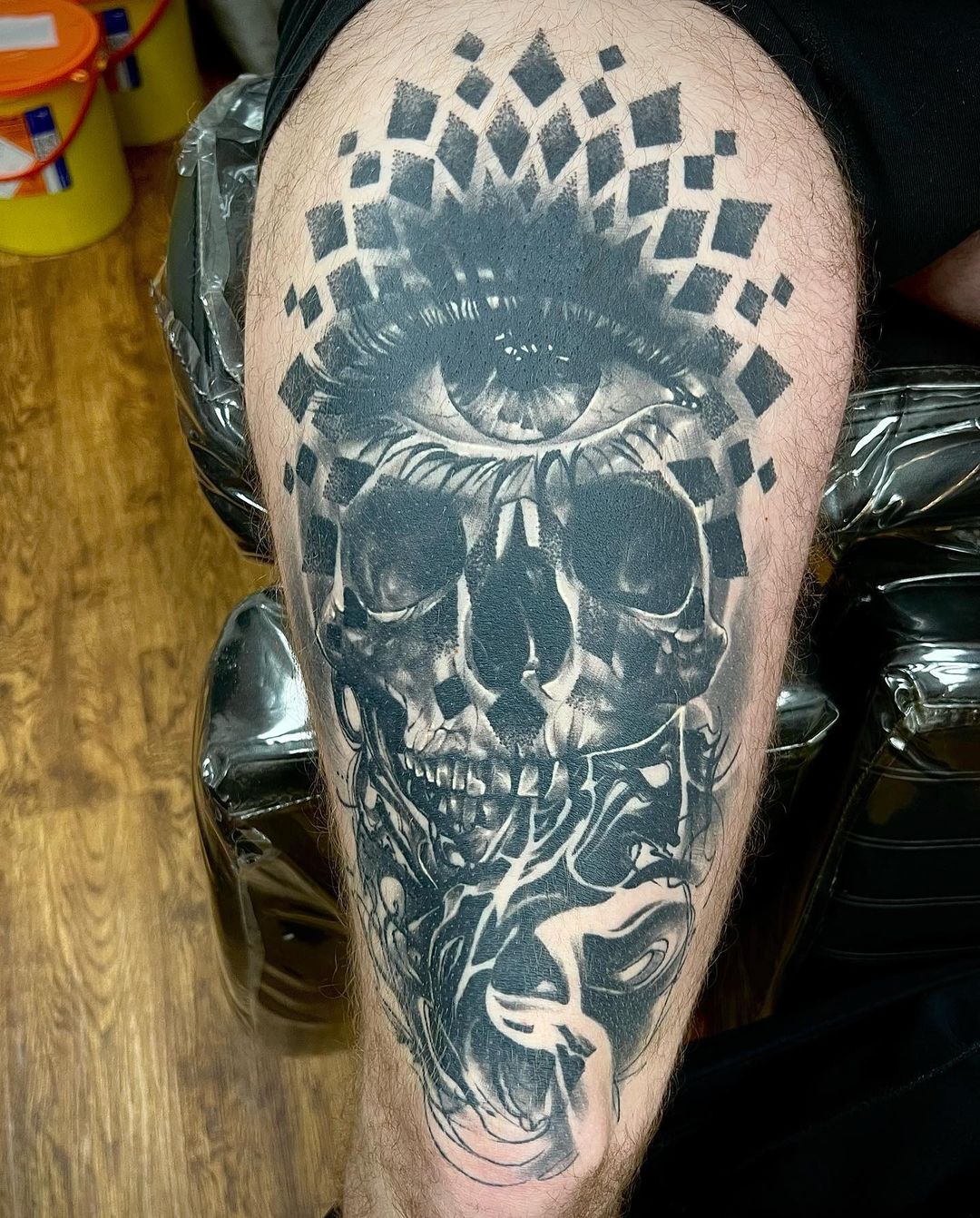  Huge Skull With Eye Tattoo