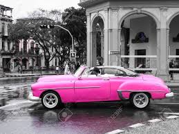 Vintage Pink Car In Old Havana (Cuba). Stock Photo, Picture And Royalty Free Image. Image 97916767.