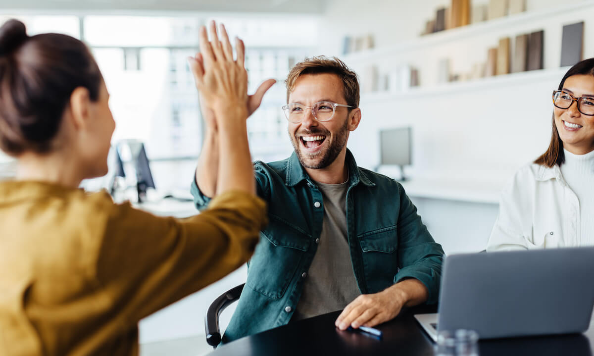 Improve patient outcome: man and woman doing the high five