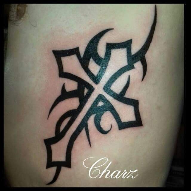 Tribal Cross Tattoo On Side Rib