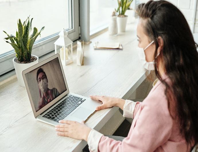 https://www.pexels.com/photo/woman-having-a-video-call-4031818/