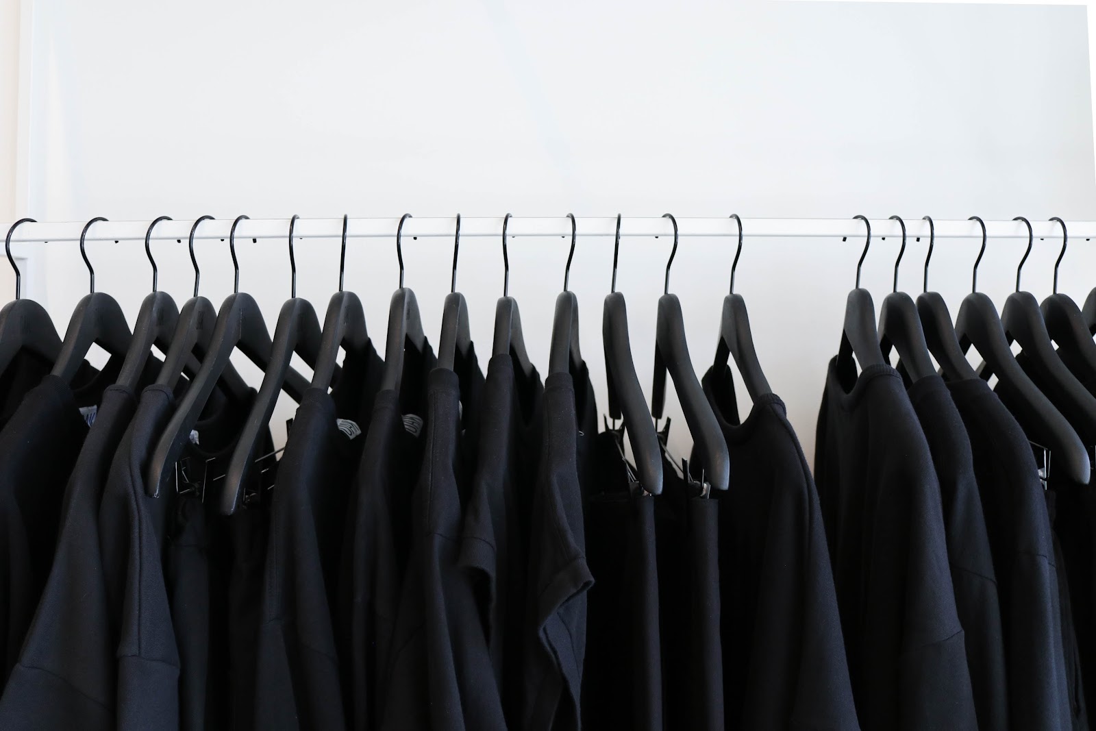 Black shirts hanging on a hanger