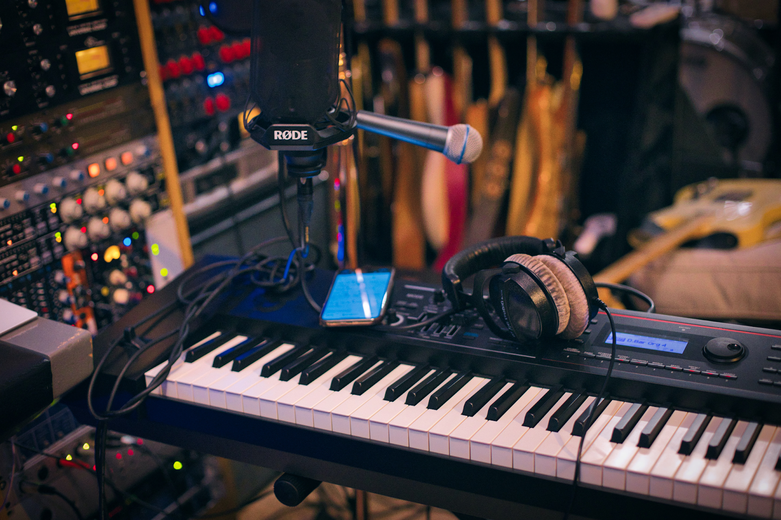 Keyboard in the music studio, music production in progress.