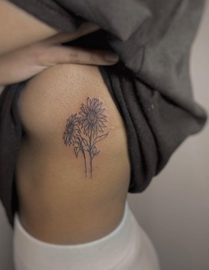 Growing Sunflower Tattoo Design On Rib