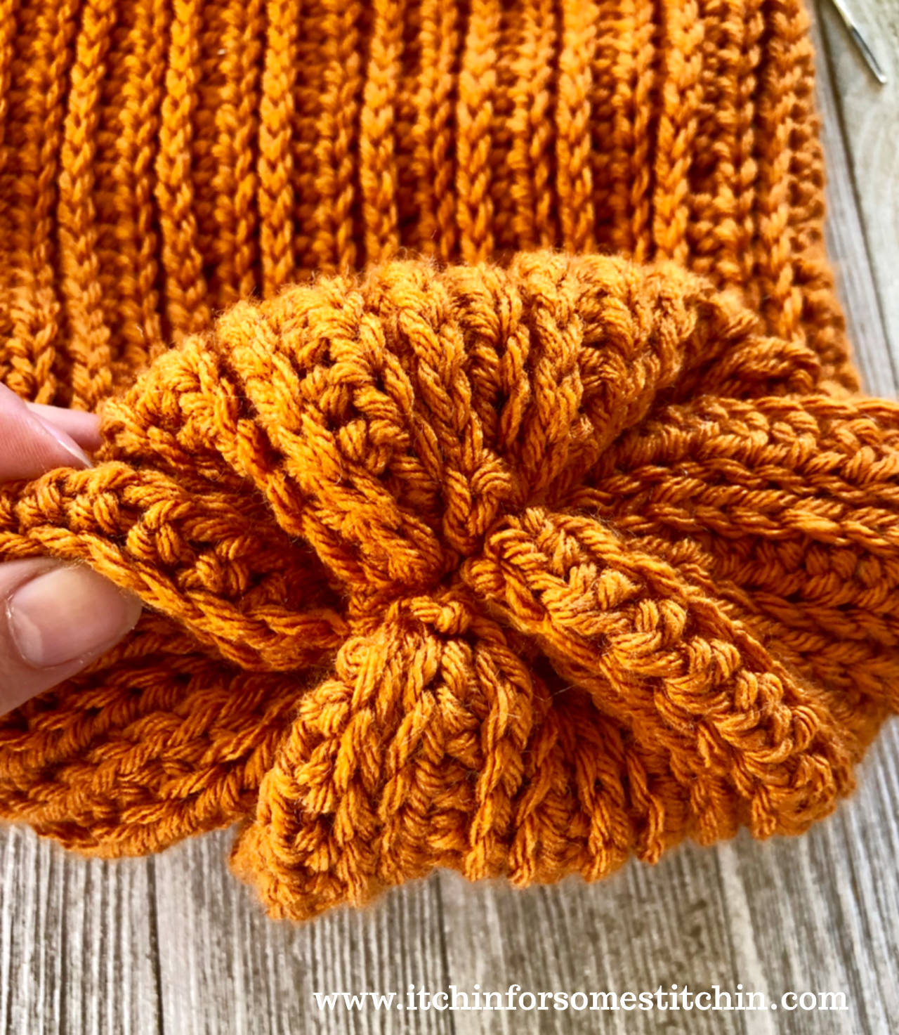 crochet pumpkin baby hat, mittens, and sleep sack by www.itchinforsomestitchin.com