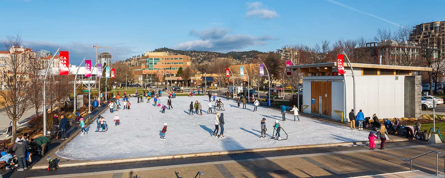 Stuart Park outdoor skating rink in Kelowna on a sunny day.
