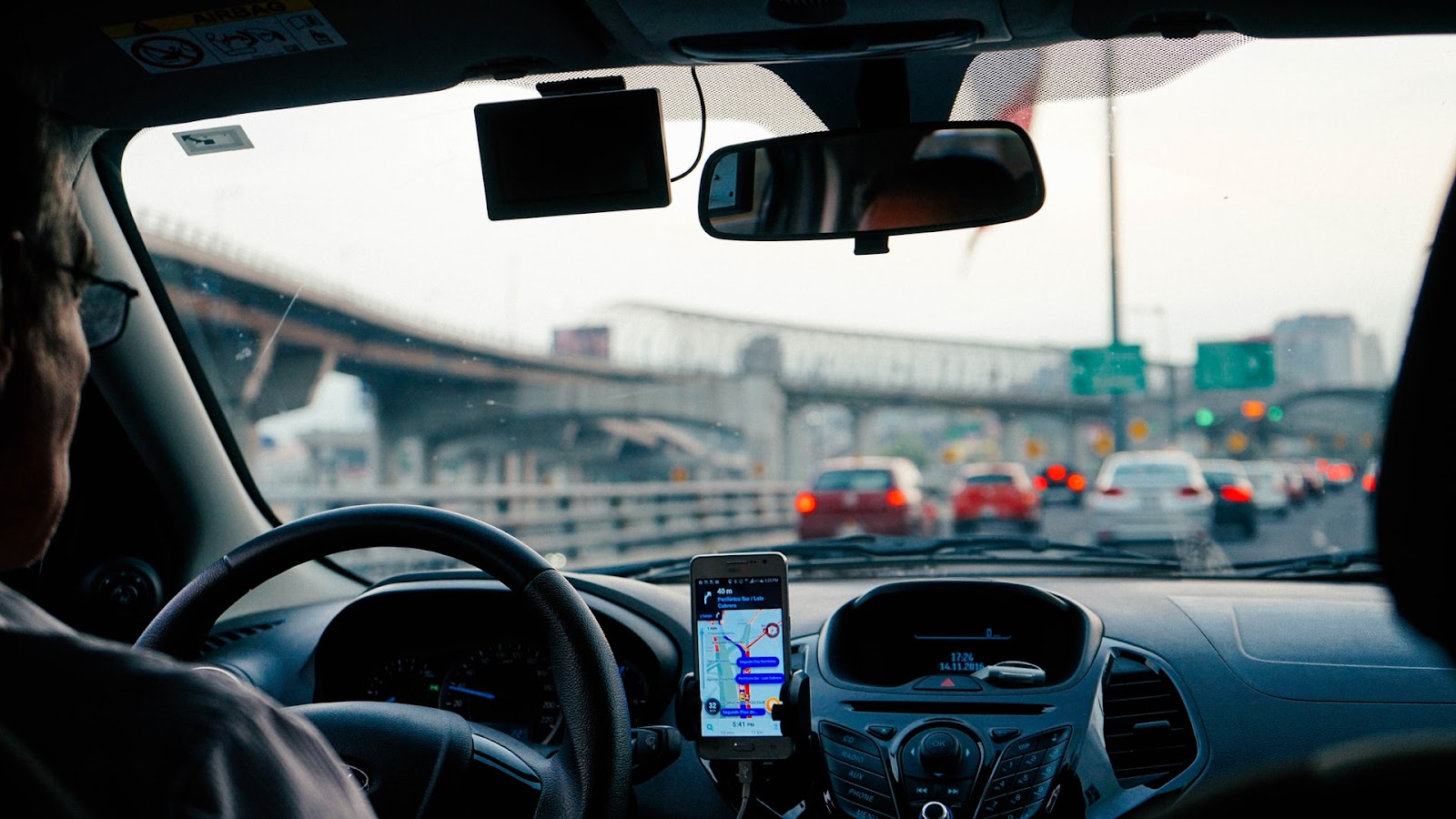 Biggest data breaches: An Uber driver, with directions on their phone, stuck in traffic
