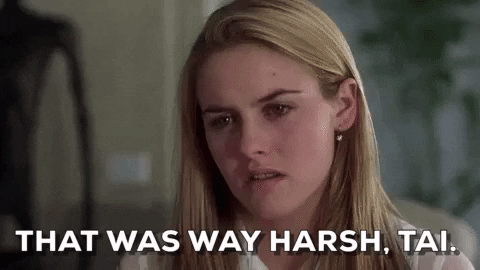 A gif with blond actress saying "that was way harsh" and looking shocked and upset.