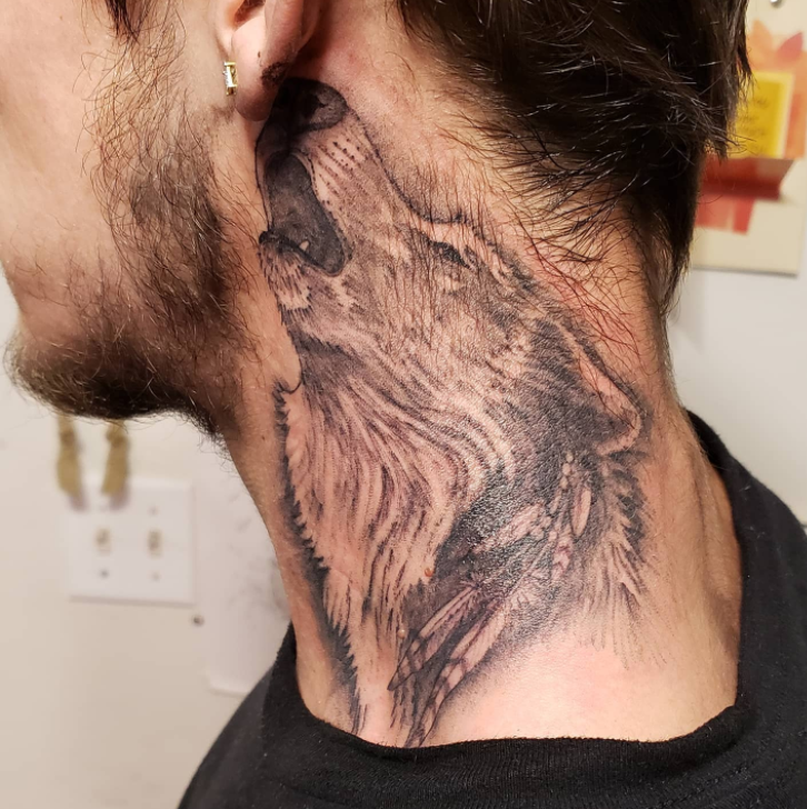 Amazing Alpha Wolf Tattoo On Left Neck