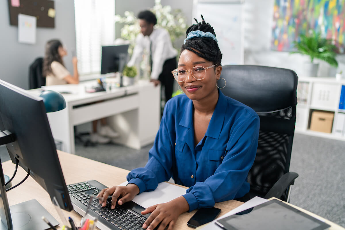 Employee smiling at the camera