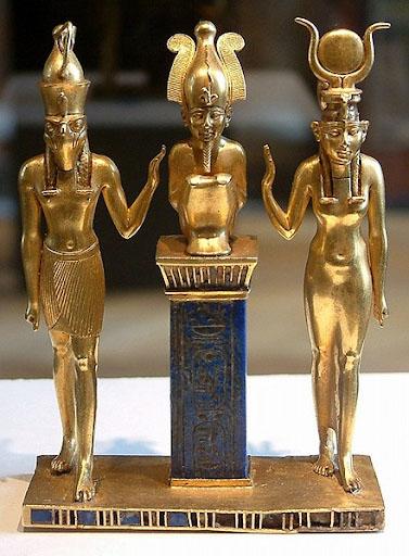 The family of Osiris. Osiris on a lapis lazuli pillar in the middle, flanked by Horus on the left and Isis on the right (22nd dynasty, Louvre, Paris).