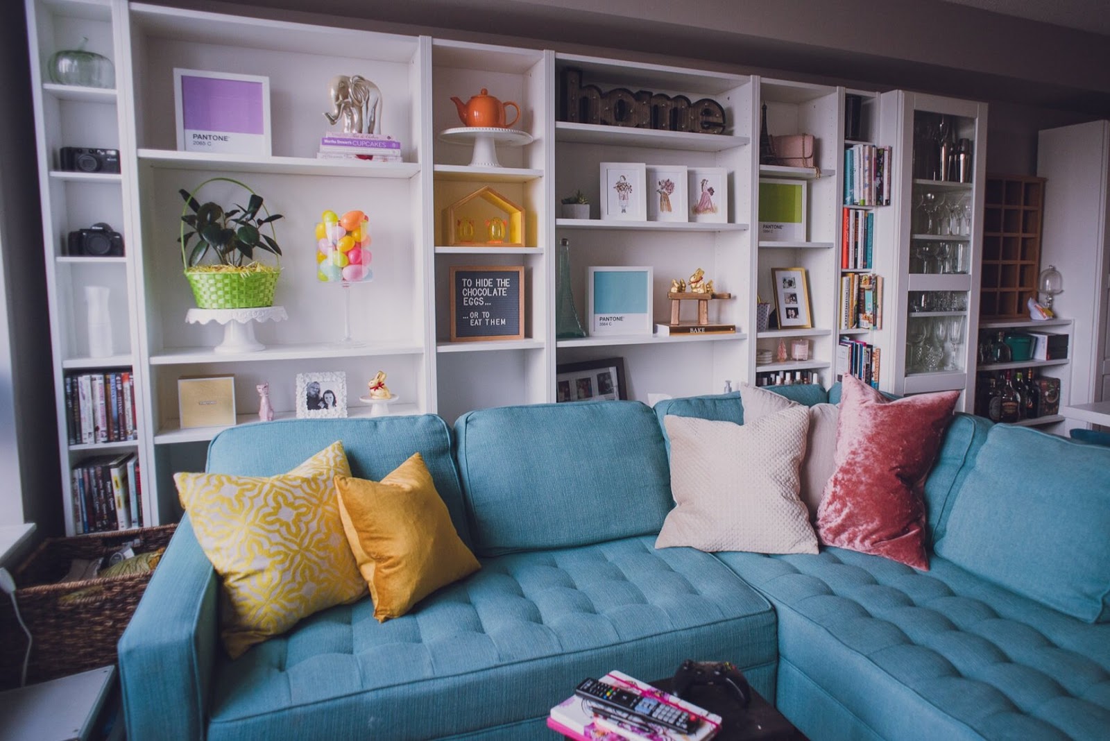 lily-muffins-blue-couch-yellow-cushions-easter-living-room