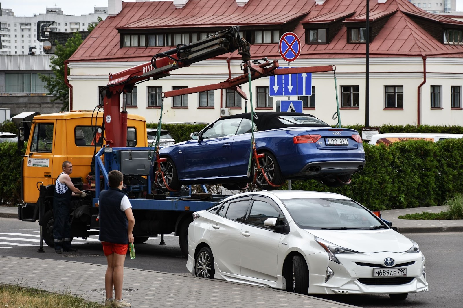 A car being towed away.