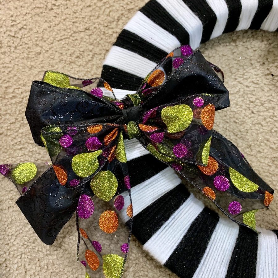Bows placed on the DIY Halloween wreath.