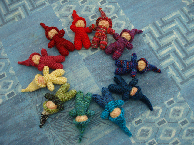 collection of gnome baby dolls in circle