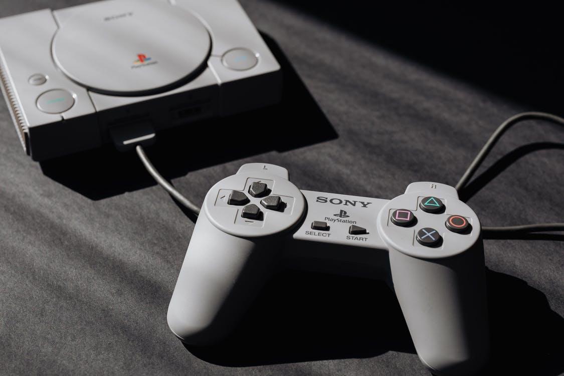 Free Photo of Play Station Game Console and Remote Controller Stock Photo