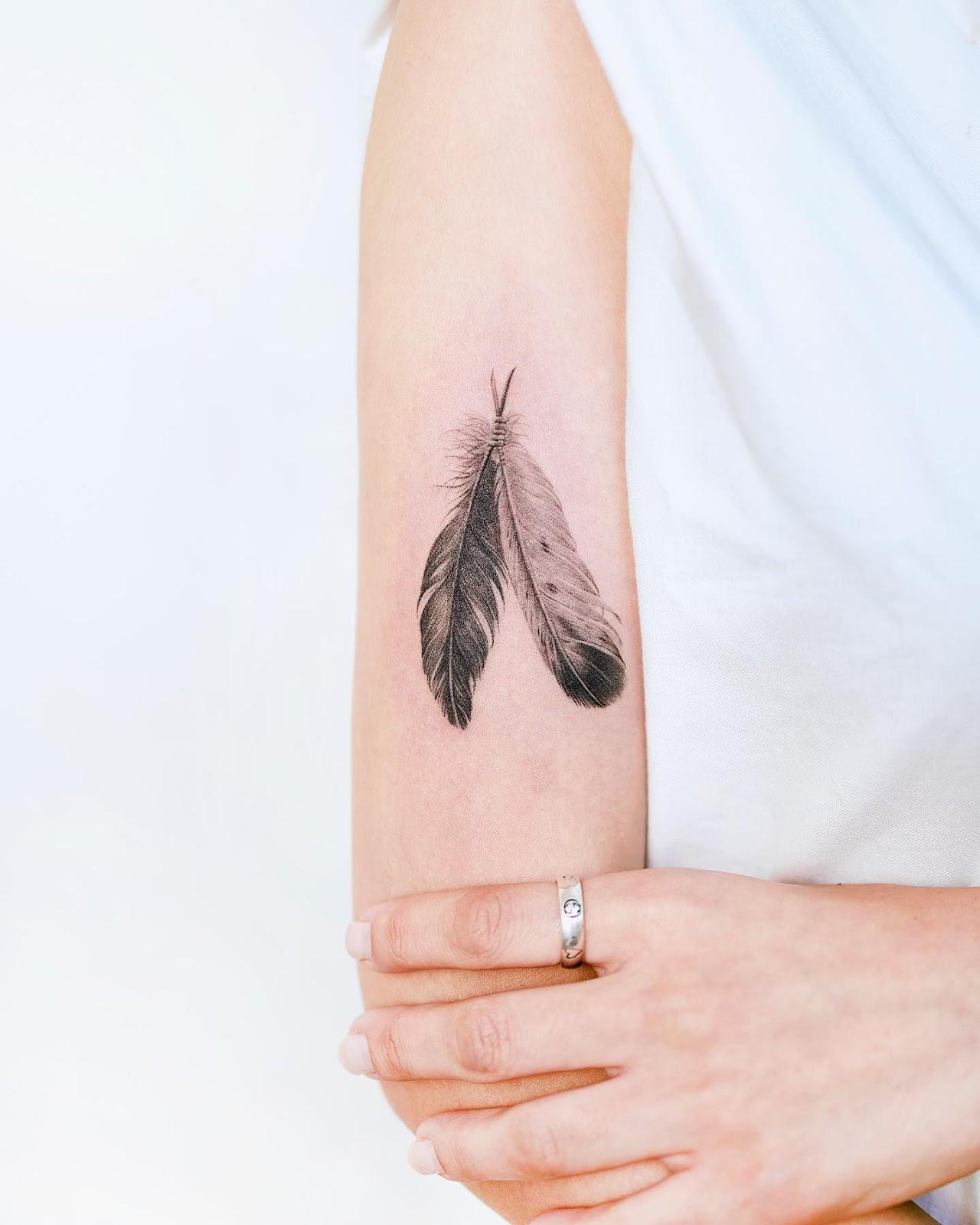 Small Tattoo Feather Design