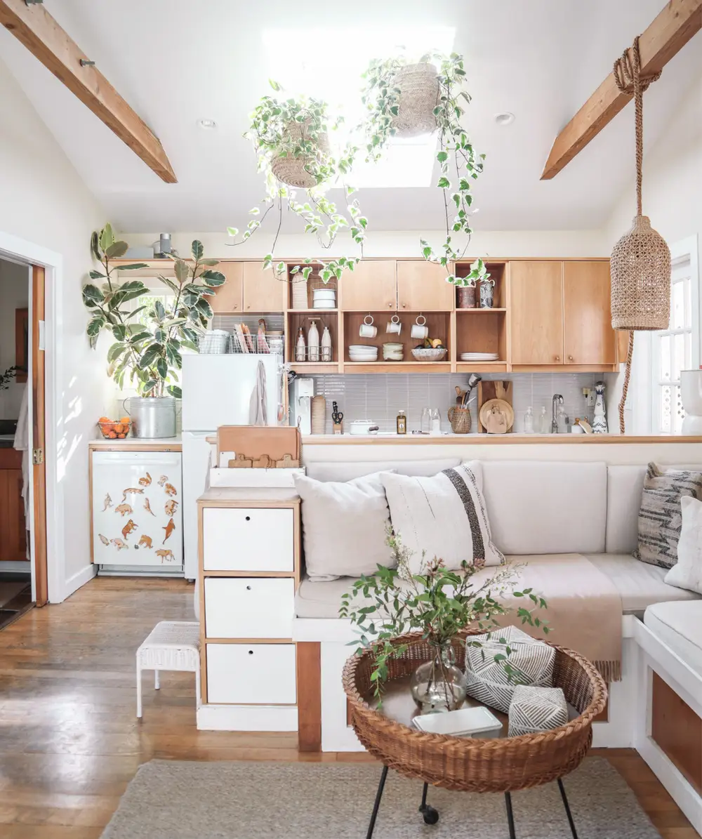 Accessorized tiny house interiors with plants and kitchen knick-knacks and small decor