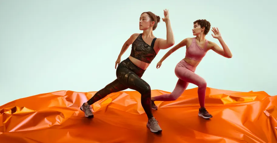 Two women exercising in Nike sportswear and shoes