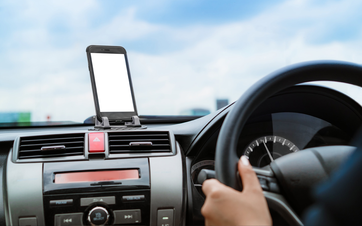smartphone on phone mount on car