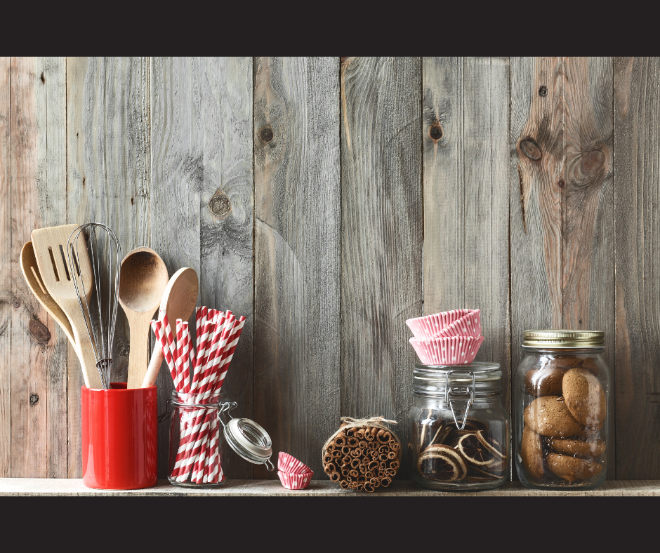 Cooking utensils and cookie jars on a table