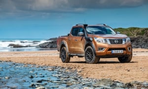 car parked on a beach