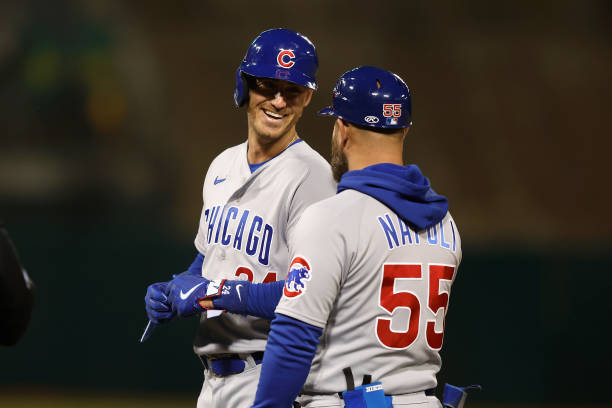 Cody Bellinger of the Chicago Cubs reacts after reaching first base on a fly ball in the top of the fifth inning against the Oakland Athletics at...