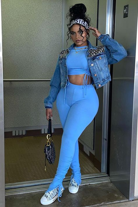 lady wearing 2 piece outfit with denim jacket and other fashion accessories