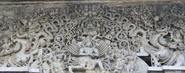 The Makar Torana. Notice Garuda and Narasimha in the centre, the ten circles in the leafy foliage and the flanking Makars on either side.