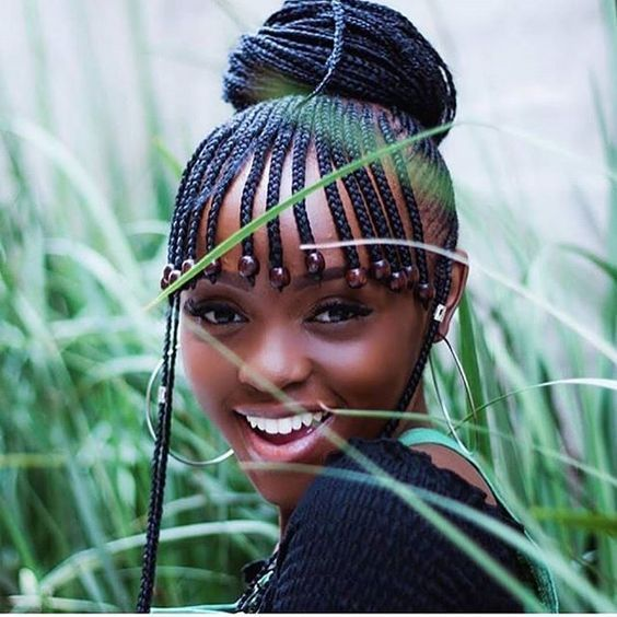 beautiful girl wearing Fulani braids