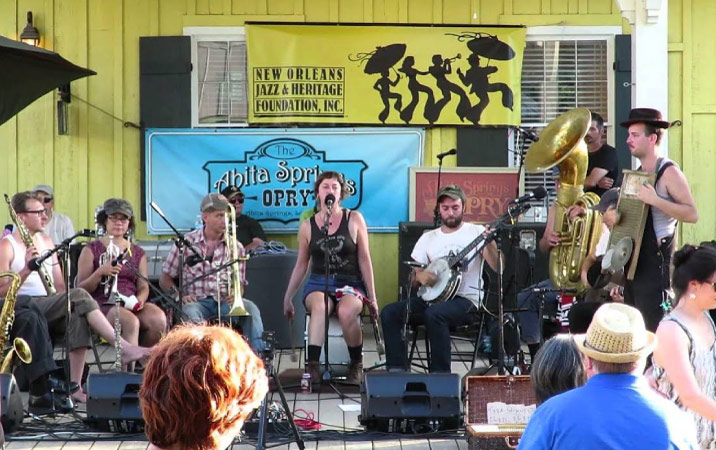 A group of musicians performing on stage at the Abita Springs Opry in Abita Springs, Louisiana.