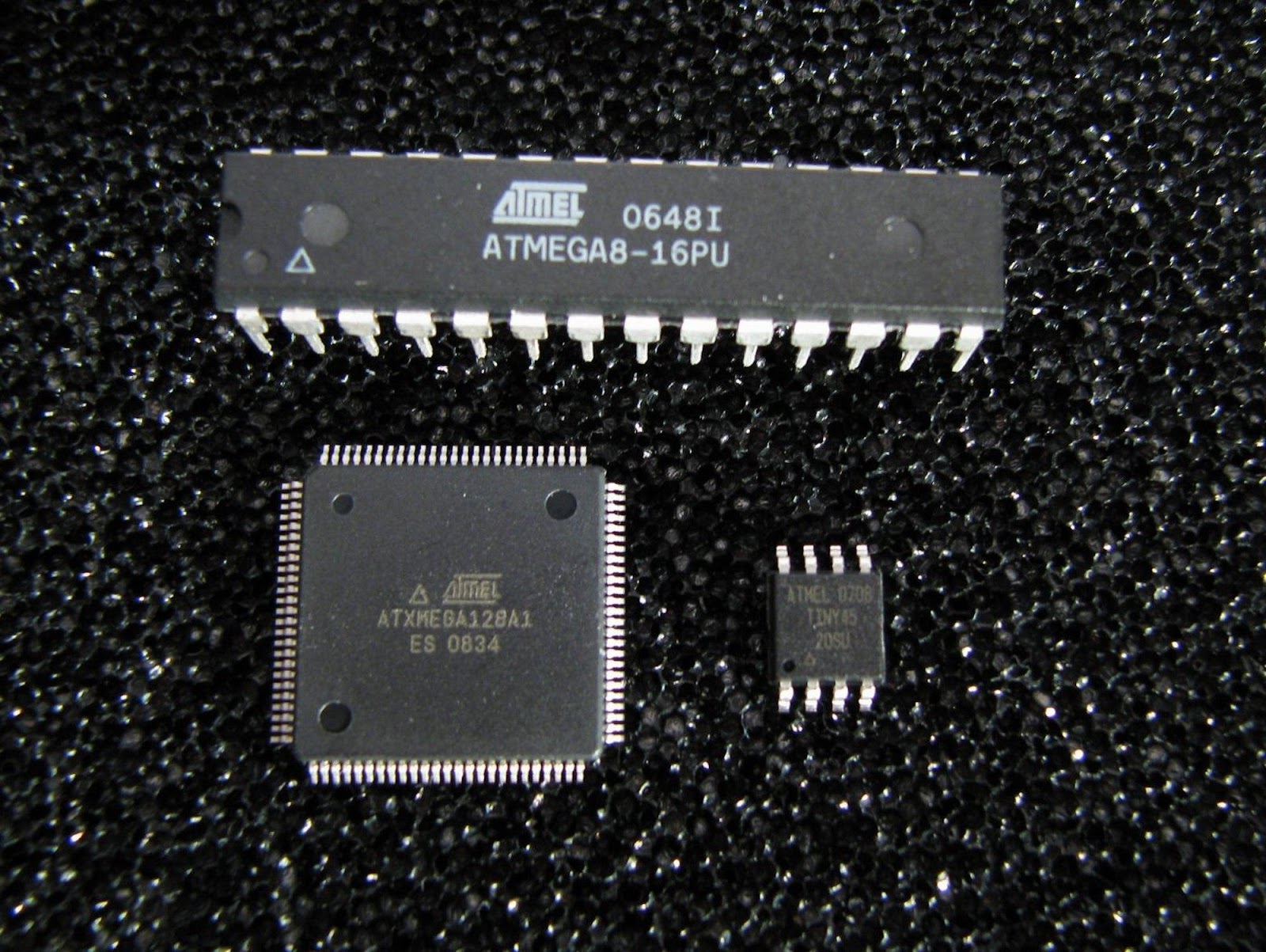 A typical ATtiny45 pinout alongside other ATMEL ICs