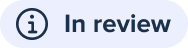 A badge that includes the text, In Review. The badge also features an information tooltip