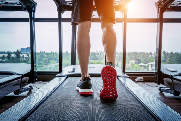 male-feet-sneakers-running-treadmill-gym-exercise-concept